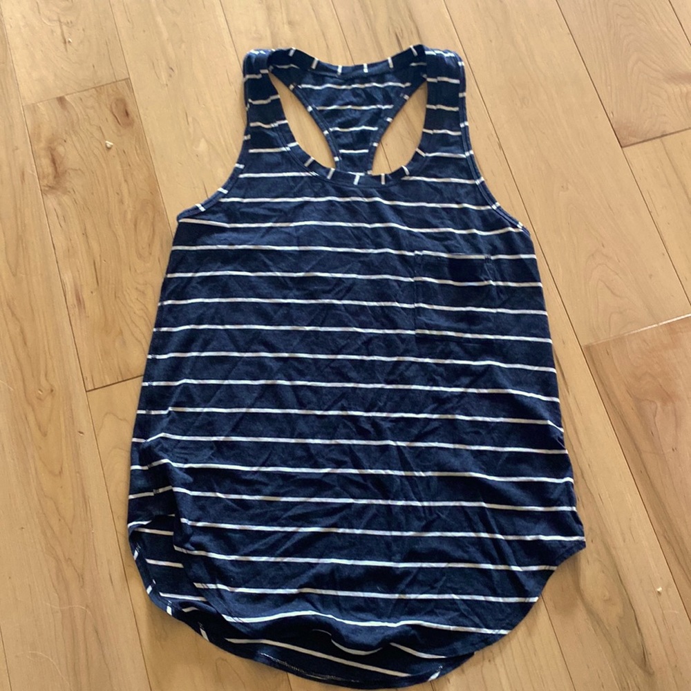 Lululemon love tank in black and white stripes and front pocket.